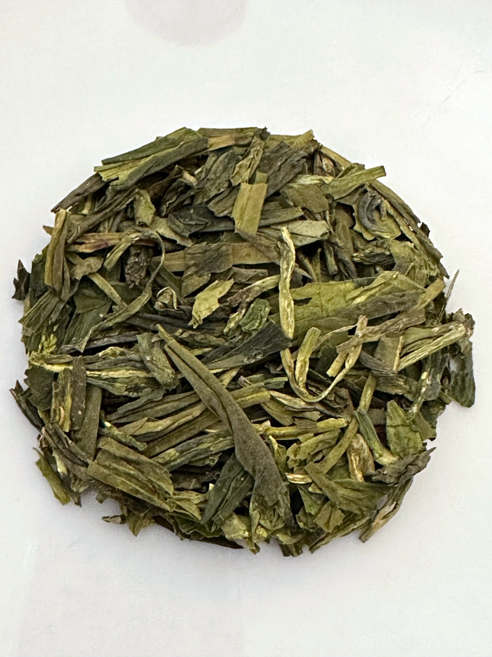 Small pile of Dragon Well #4 Green Tea